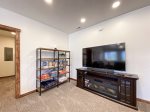 65` smart TV and Games on lower level